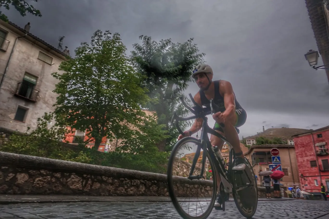 Manuel riding the bike leg of a triathlon